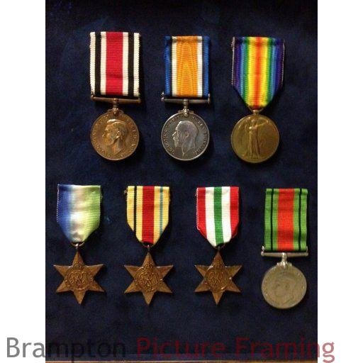 Framing of 11 medals