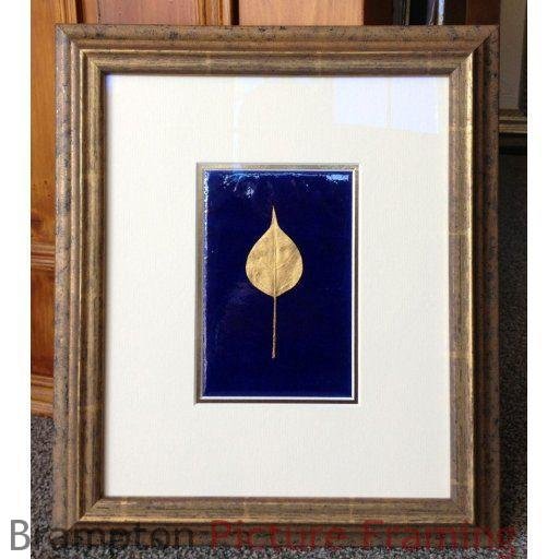 Gold leafed leaf framed